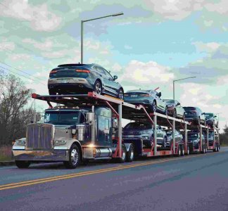 Realistic image of car shipping, auto transport trucks carrying vehicles, car carrier trailers...jpg Realistic image of car shipping, auto transport trucks carrying vehicles, car carrier trailers...jpg